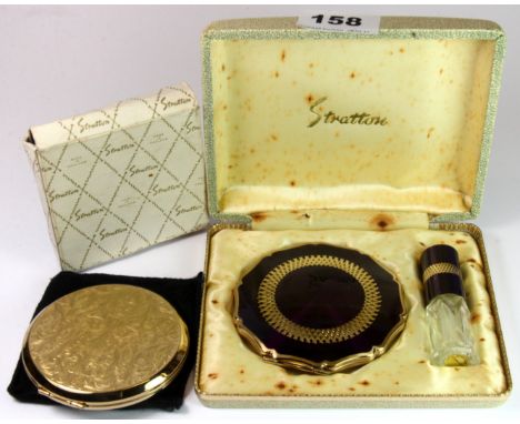 Two vintage Stratton compacts.