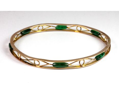 A 9ct yellow gold (stamped 375) bangle. Dia. 7.5cm (approx. 11.5gr).