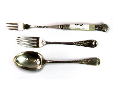 A Georgian hallmarked silver spoon and fork engraved with fern decorated together with a silver mounted and mother of pearl p