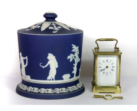 A miniature brass and four glass carriage clock, H. 10cm (A/F), together a Wedgwood blue jasperware biscuit barrel, H. 17cm (