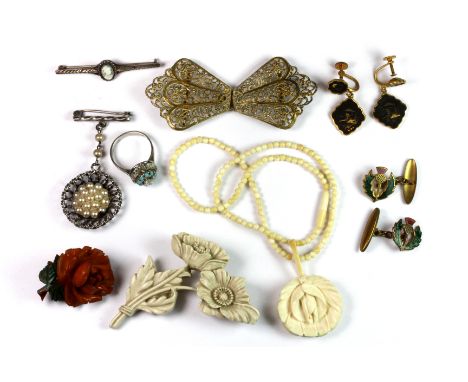 A box of interesting vintage jewellery items.