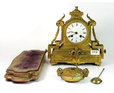 A 19th century French gilt mantle clock and stand, H. 28cm.