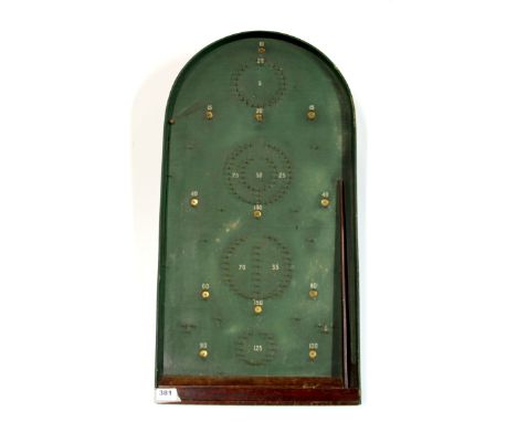 A wooden bagatelle game.