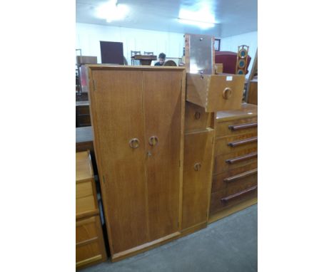 A light oak tallboy 