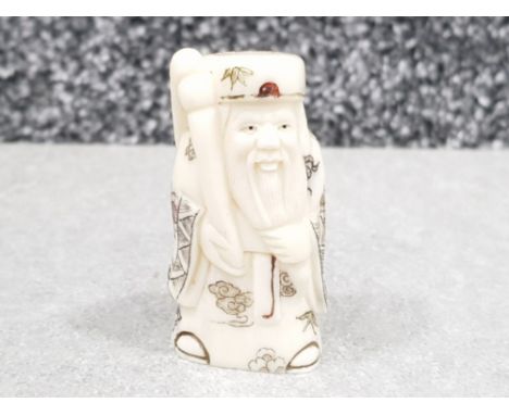 Japanese handcarved bone Netsuke in the form of a village elder
