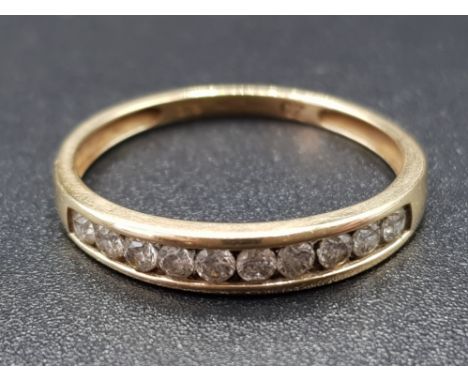 Ladies 9ct yellow gold cubic zirconia band ring, size P½, 1.3g gross