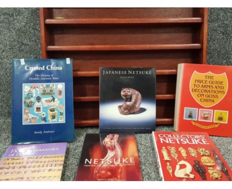 6 hardback price guides, genres cover china, souvenir ware and Nesuke's, also includes wooden 5 tier Netsuke display
