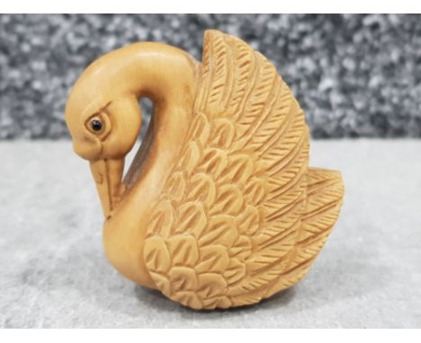 Handcarved hardwood Netsuke in the form of a Swan, height 5cm