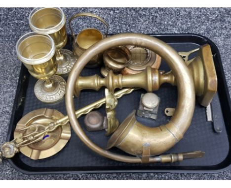 Tray of brass goblets, candlestick, cat poker stand, automative horn, toasting forks etc
