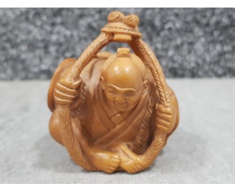 Large handcarved hardwood Netsuke in the form of a old japanese man, height 5cm x length 5cm