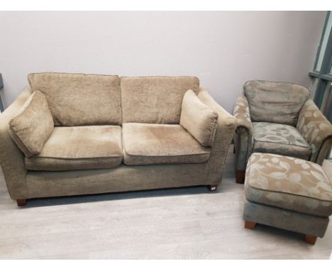 A Marks &amp; Spencer two seater sofa, and an armchair and matching pouffe by the same maker.