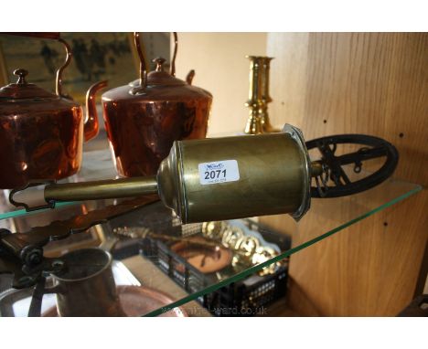 A Brass Spit Jack with wall bracket