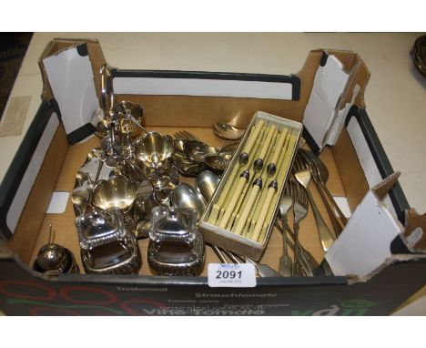 An Epns egg cup set on stand (one spoon missing), plated Cruet, Unity Sheffield butter knives, plated fruit spoons, plated sp