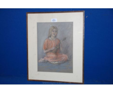 A pastel of a seated girl playing a Lute, pencil inscribed, Italy circa 1920.