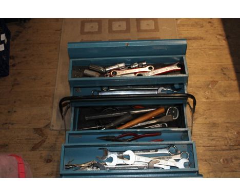 A metal tool box and contents 