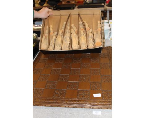 A vintage chess board and chess pieces 