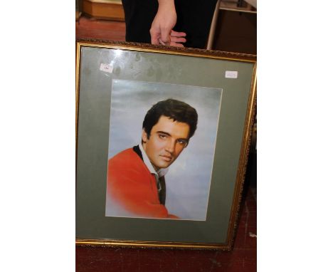 A framed Elvis Presley print 