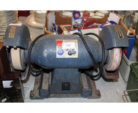 An electric bench grinder 