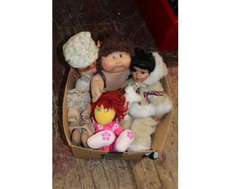 A job lot of assorted soft toys including a Cabbaged Patch doll 