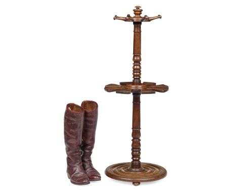  WILLIAM IV MAHOGANY REVOLVING BOOTSTAND EARLY 19TH CENTURY the turned central knop and column with whip spindles and a circu