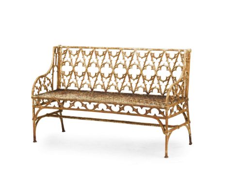  VAL D'OSNE CAST IRON BENCH 19TH CENTURY with quatrefoil pierced panel back and foliate scroll arms, raised on curved X form 