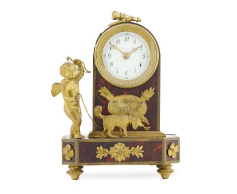  FRENCH RED TORTOISESHELL AND BRASS MOUNTED BOULLE FIGURAL MANTLE CLOCK LATE 19TH CENTURY the white enamel dial with Arabic n