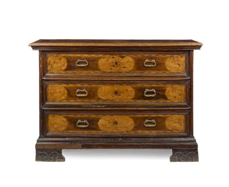 NORTH ITALIAN WALNUT AND MARQUETRY COMMODE EARLY 18TH CENTURY the quarter-panelled and banded top with a moulded edge, above