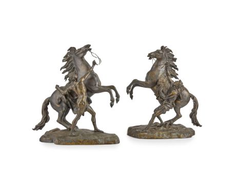  PAIR OF BRONZE MARLY HORSES, AFTER COUSTOU EARLY 20TH CENTURY dark brown patina, unsigned (2) 49cm high, 40cm wide   
