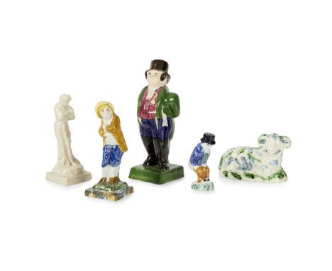  COLLECTION OF POTTERY FIGURES 19TH CENTURY including a creamware lamb with blue and green glaze, probably North East region;