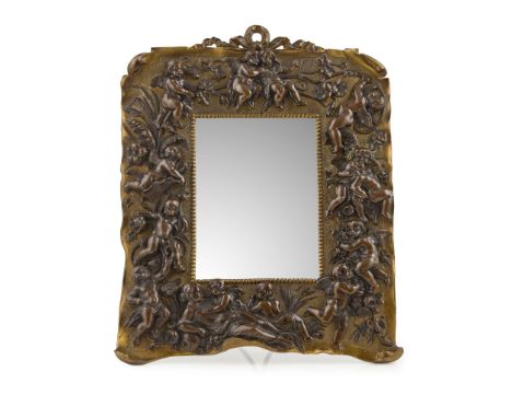  FRENCH GILT AND PATINATED BRONZE TABLE MIRROR LATE 19TH CENTURY cast in relief with cherubs playing amongst vines, the figur
