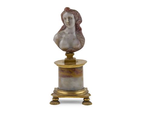  CARVED CHALCEDONY AND GILT BRONZE MOUNTED BUST OF VENUS 19TH CENTURY the female bust with long flowing hair, on a gilt metal