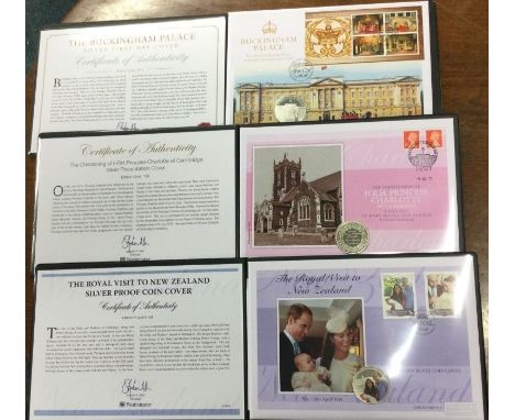 A group of three commemorative Royal First Day Cover silver coins and stamps.