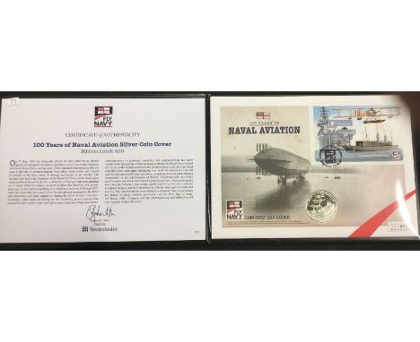 A commemorative '100 Years of Naval Aviation' First Day Cover silver coin and stamp set.