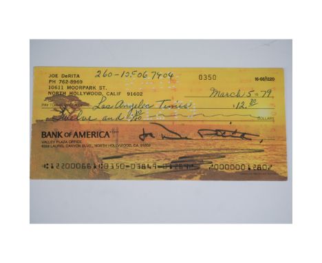 A personal check signed by Joe DeRita, famously known as Curly Joe of The Three Stooges. Dated March 5, 1979, this check was 