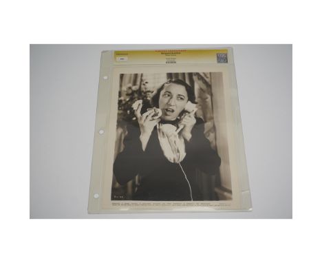 A vintage Margaret Hamilton black-and-white publicity photograph, authenticated and encapsulated by CGC. Best known for her i