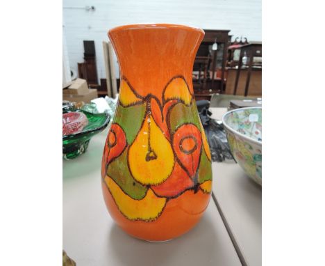 A Poole pottery design vase having stylised orange ground, monogrammed to base