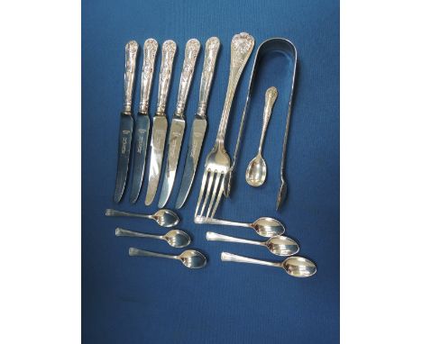 A selection of HM silver flatware including Victorian sugar nips, salt spoon, HM silver handled butter knives etc