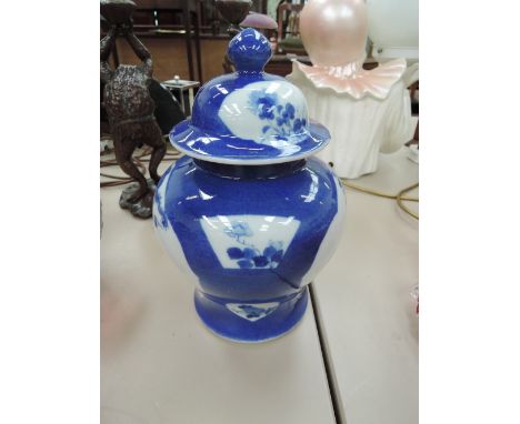 A Chinese blue and white lidded jar having pictorial panel decoration
9" high
Condition: Some minor firing blips (see additio