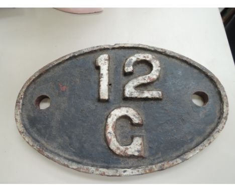 A cast shed plate numbered 12C, from the last steam engine leaving Oxenholme Station