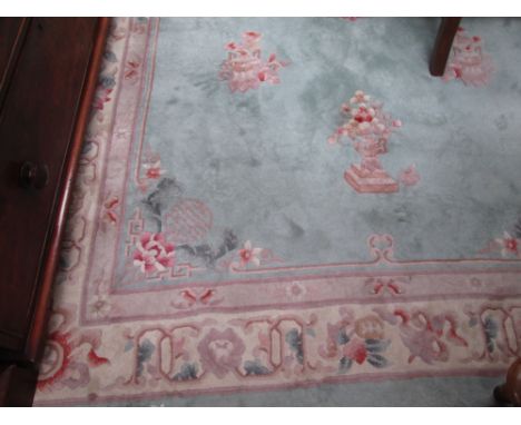 A late 20th century Chinese carpet square having turquoise ground
