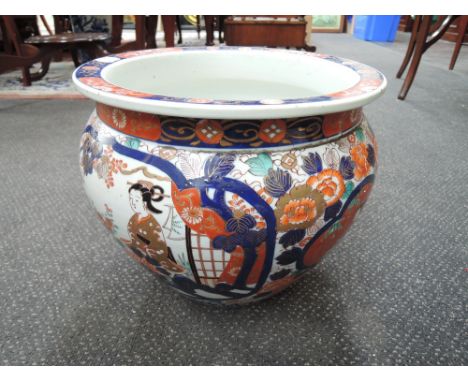 An early 20th century Japanese goldfish bowl having pictorial Imari decoration