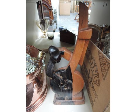 A treen figure modelled as stylised Art Deco inspired double bass player