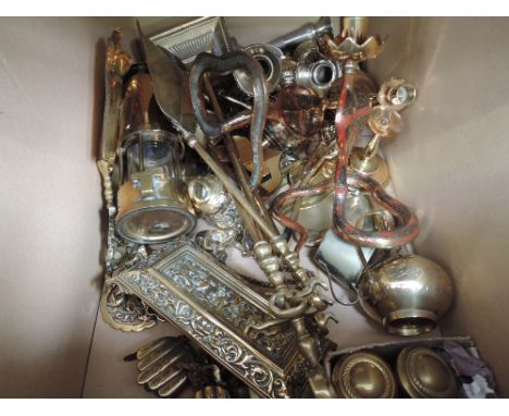 A selection of brassware including fire irons, Indian candlesticks, miners lamp etc