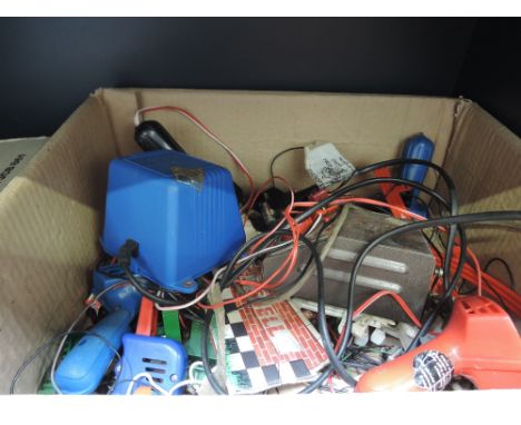 A selection of vintage Scalextric cars and accessories
