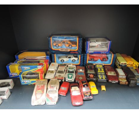 A shelf of mixed die-casts including Matchbox and Corgi etc some with boxes