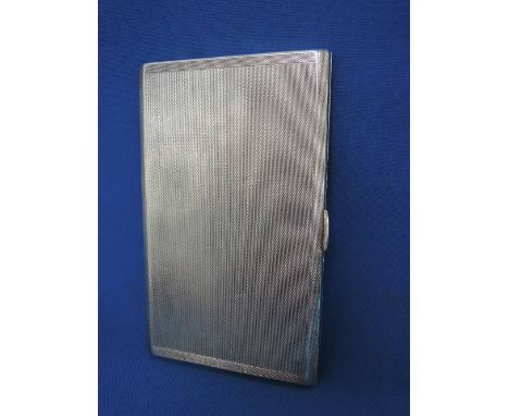 A silver cigarette case having engine turned decoration, Birmingham 1940, Albert Hill,  approx 235g