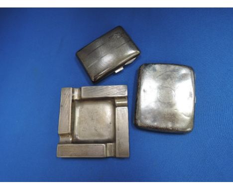 A silver ashtray of square form having engine turned decoration, Birmingham 1958, Sanders & Mackenzie, and two HM silver ciga