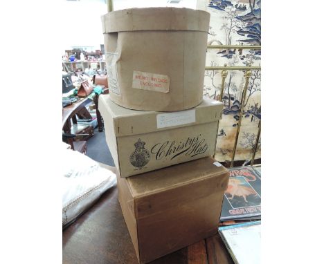 A selection of three vintage gents hats in original hat boxes, including a Christies of London brushed velvet top hat by Sam 