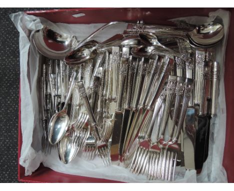 A selection of silver Community plate cutlery including fruit knives and forks, soup ladle, coffee spoons etc