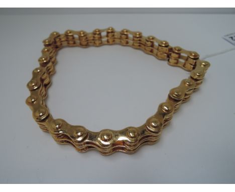A 1980's choker necklace by Christian Dior modelled as a bike chain